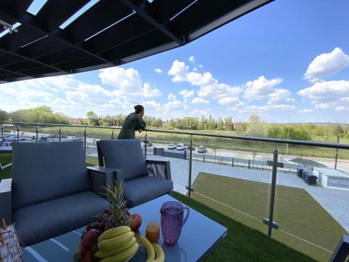 Keszthely Apartment | Discover Dandelion Royal Homes: Oceanfront Bliss Awaits