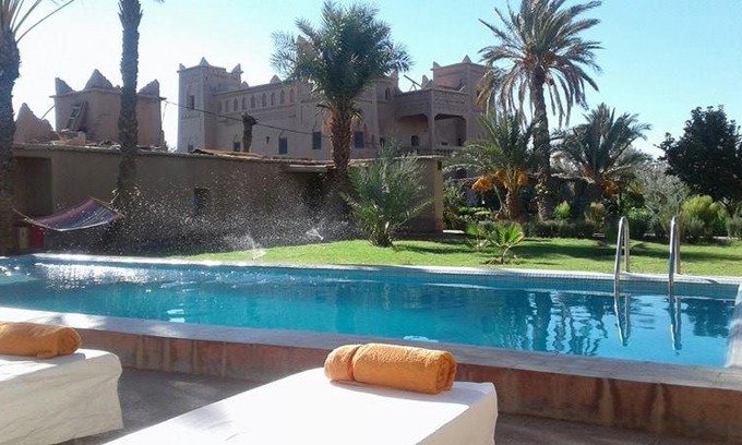 Skoura Hotel | Discover Dar Es Salam: Pet-Friendly Haven with Pool & Dining