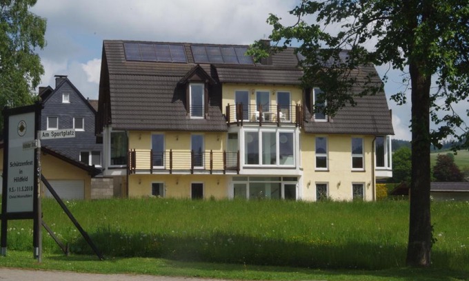 Hildfeld Apartment | Experience Comfort at Das Gelbe Haus 3 with Pool Access