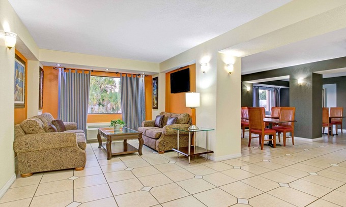 Tampa Hotel | Convenient Days Inn & Suites Near Ybor City with Pool