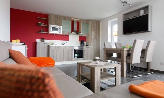 Wurster Nordseekuste Apartment | "De Kohbloom" - Relax on the North Sea in cozy dike proximity with balcony!