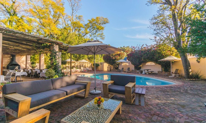 Paarl Bed & Breakfast | Discover De Leeuwenhof Estate: 4-Star Retreat with Pool