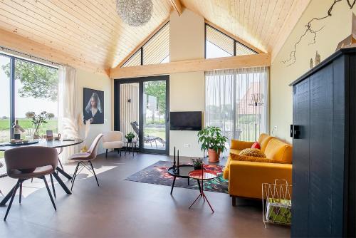 Slappeterp Apartment | De Non: Guest Rated 10/10 with Ocean View & Hot Tub