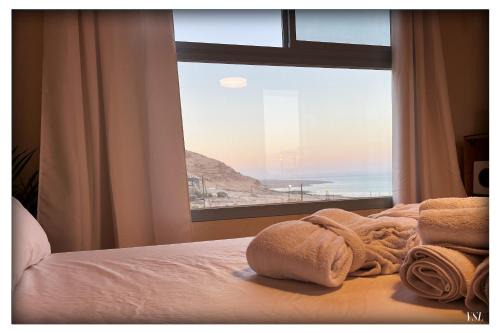 Al-Maghtas Apartment | Relax at Dead Sea Rooftop: Hot Tub & Breakfast Included