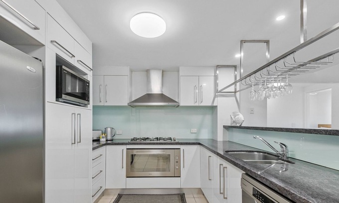 Brisbane House | Inviting Deep Blue Apartment 8 in Tangalooma, Family-Friendly