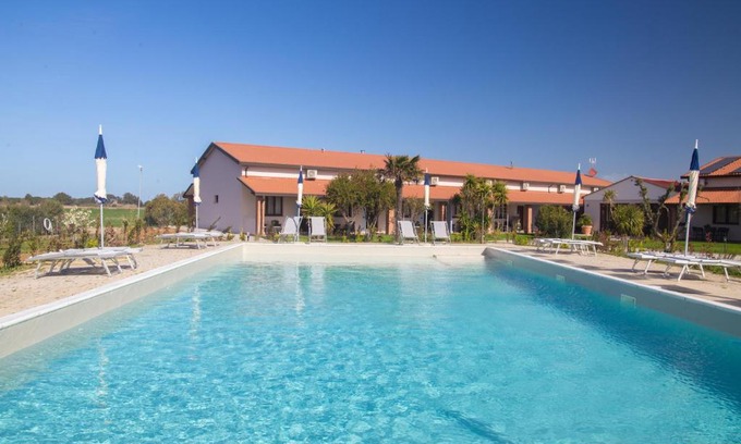 Cecina Hotel | Discover Delfino Tuscany Resort: Oceanfront Bliss Awaits