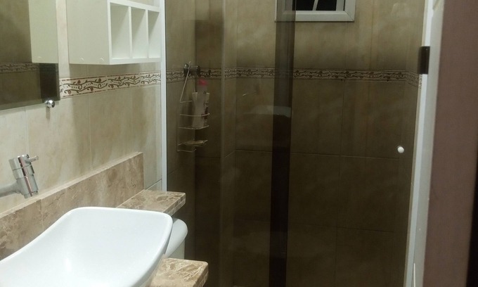 Mirim Apartment | Beachside Apartment with Ocean View & Family-Friendly Amenities