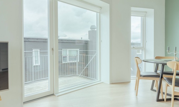 Hoyvik Apartment | Inviting 2 Bedroom Apartment with Balcony and Parking