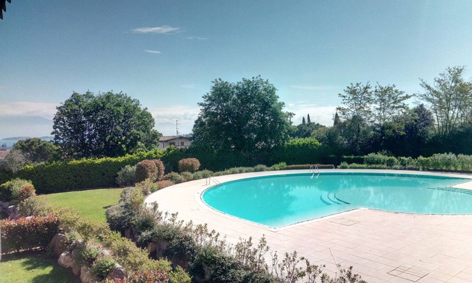 Rivoltella Apartment | Scenic Apartment with Lake View and Spa Amenities