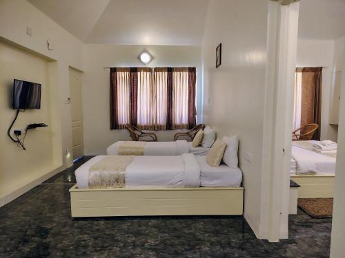 Thalayathimund Resort | Delightz Inn: Family-Friendly Stay with Breakfast Included