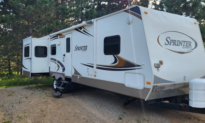Nevis RV Rental | Top-Rated Deluxe Camper at Family-Friendly RV Park