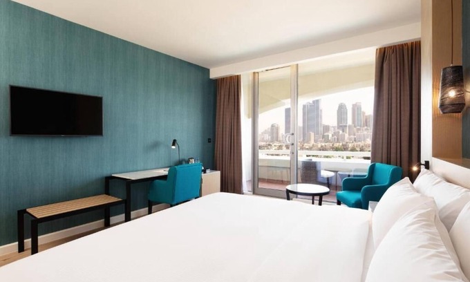 Beach & Coast Apartment | City View Retreat with Balcony Near Al Khan Beach