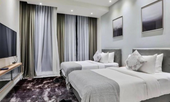 Malaysian Police Training Centre Apartment | Stylish King Suite with Breathtaking Twin Tower Views