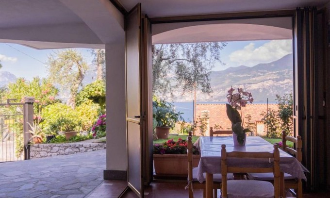 Magugnago Apartment | Relax at Delvai by Interhome: Oceanfront Oasis with Pool