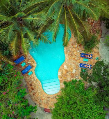 Paje Cabin | Discover Demani Lodge Zanzibar: Poolside Paradise Awaits