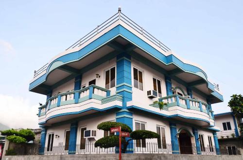 Basco House | Cozy Den Den Guesthouse: Family-Friendly with Kitchen Access