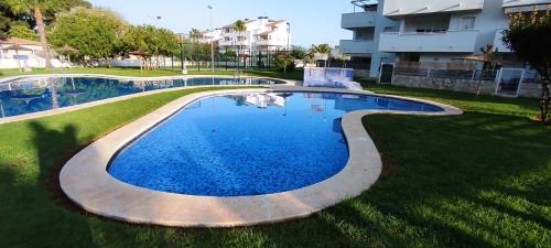 Les Deveses Apartment | Denia Beach Apartment with Private Garden & Pool Access