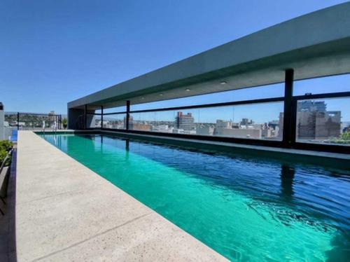 Villa Carlos Paz Apartment | Central Getaway in Villa Carlos Paz with Pool & Ocean Views