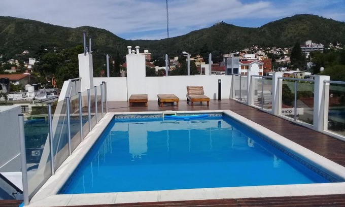 Villa Carlos Paz Apartment | Family-Friendly Retreat in Carlos Paz with Pool Access