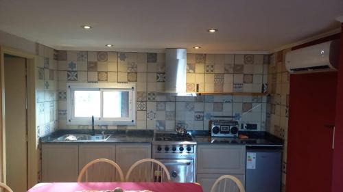 Macachin Apartment | Guest Rated: 9.6 at Departamento Los Sauces with Hot Tub