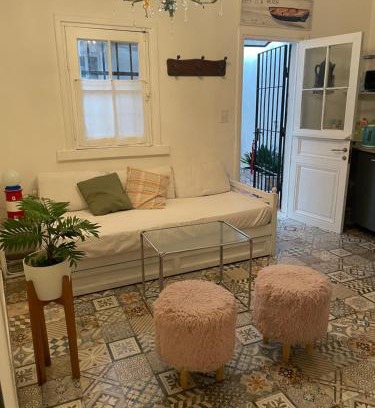 San Isidro House | Family-Friendly Ocre Apartment with Expansive Garden
