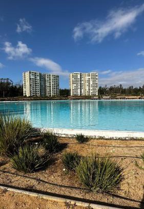 El Tabo Apartment | Inviting Playa Las Cruces LagunaMar: 4-Star Family Retreat