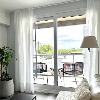 San Nicolas de los Arroyos Apartment | Riverside Retreat: Family-Friendly Stays with a View