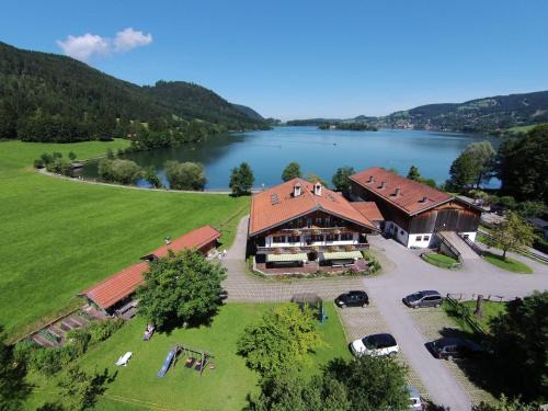Fischhausen House | Experience Der Anderlbauer am See with Oceanfront Bliss