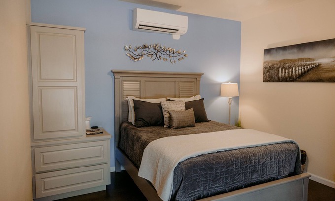Dripping Springs House | Idyllic Descansar Room at La Aldea Building, Asante Lodging