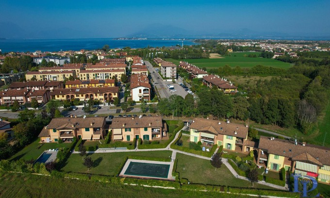 Desenzano del Garda Apartment | Olimpia Escape: Poolside Oceanfront Retreat Awaits You