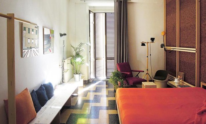 Porta Volta Apartment | Chic Double View Flat: Family-Friendly Comfort Awaits