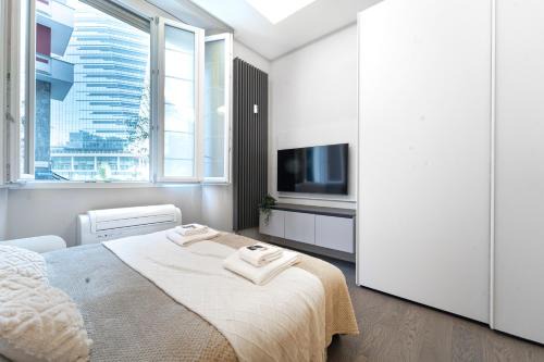 Centro Direzionale Apartment | Contemporary Milanese Studio in Vibrant City Neighborhood