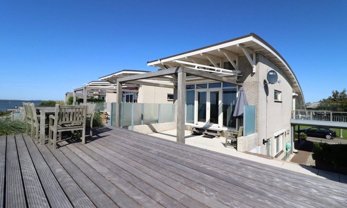 Makkum Cabin | Idyllic Villa by the IJsselmeer with Family-Friendly Amenities