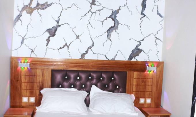 Bafang House | Discover Deudjui Hôtel: Family-Friendly with Breakfast Included