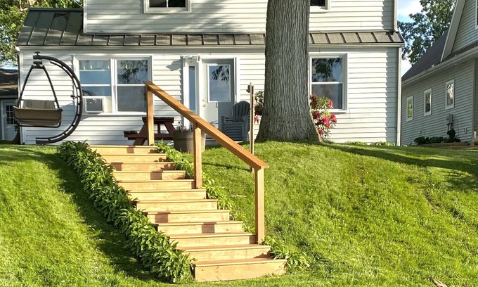 Manitou Beach-Devils Lake Cottage | Devils Lake Waterfront Home with Pool & Breathtaking Views