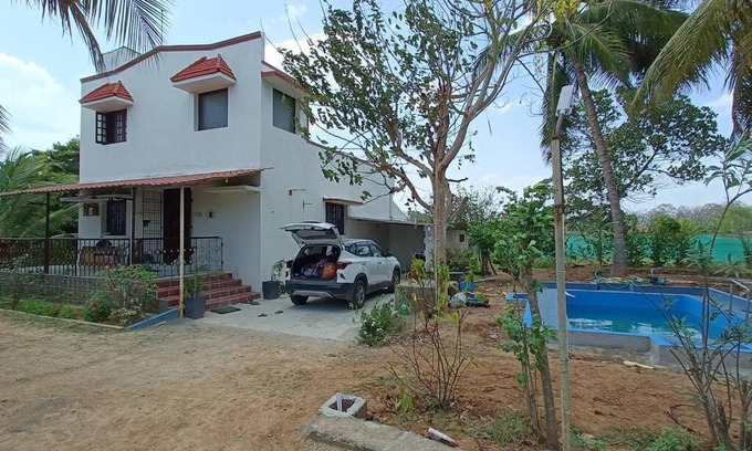 Cheyyur House | DevZ Farm: Top-Rated Stay with Pool & Pet-Friendly Amenities