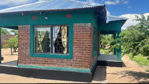 Mfuwe Cabin | Dewclaw Baobob Safari Lodge
