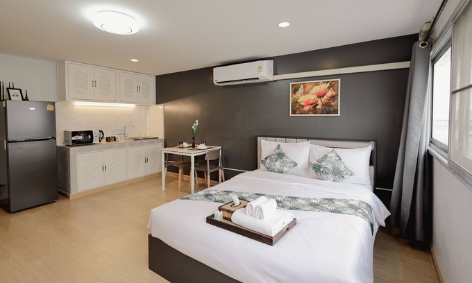 Ban Mai Apartment | Discover DHIresidence at Impact Muangthong: Family-Friendly Stay