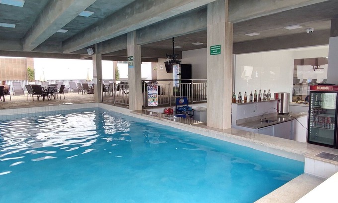 Prive das Caldas Apartment | Top-Rated Di Roma Spazzio with Pool & Ocean View
