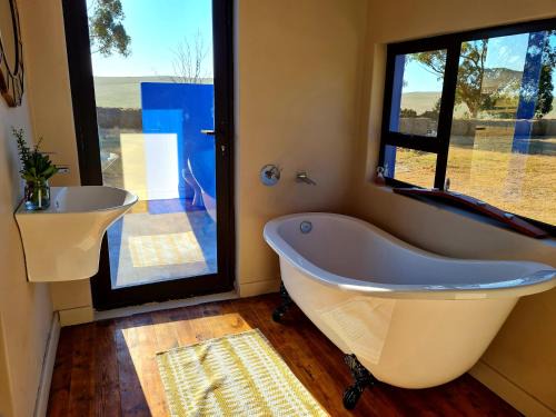 Overberg District Municipality House | Discover Die Blouhuis Farmhouse Retreat with Hot Tub Access