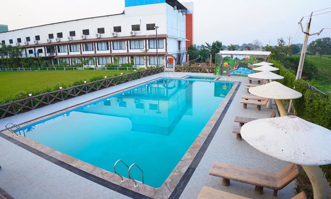 Matar Hotel | Discover Diganta Resort: Family-Friendly Retreat with Pool