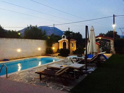 Eretria Villa | DIMIS Poolside Villa with Oceanfront Views & Guest Rated 10/10