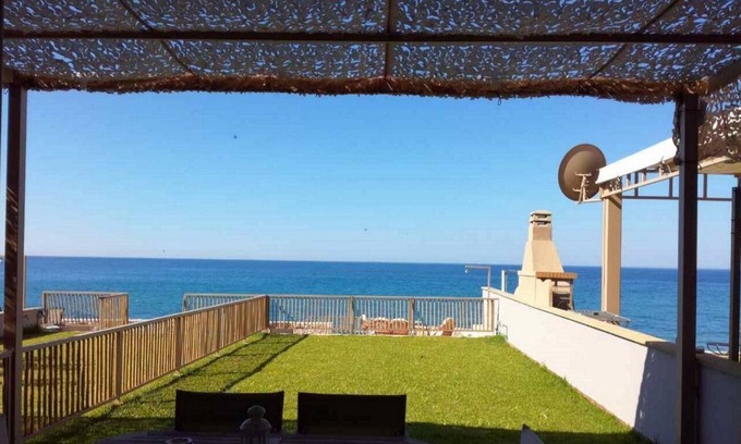 Ag. Georgios Villa | Relax by the Sea at Dip in the Blue - Pet Friendly Home