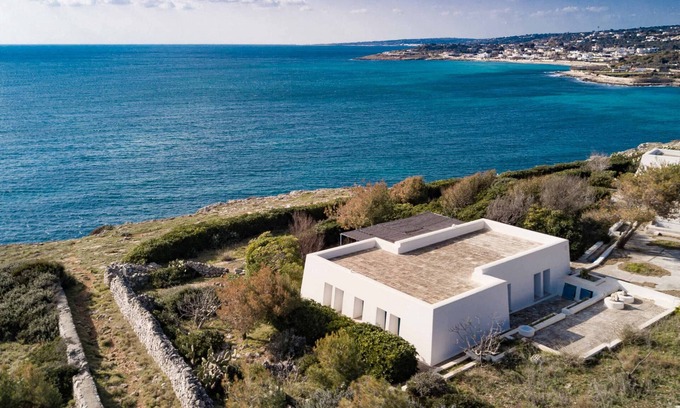 Marina di Felloniche Ski Chalet | Seaside Retreat with Direct Ocean Access & Top-Rated Amenities