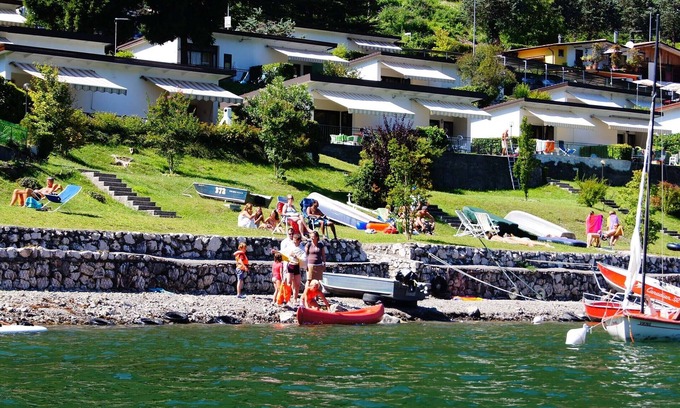 Idro Apartment | Lakefront Haven with Terrace & Pool - Rated 9.6/10