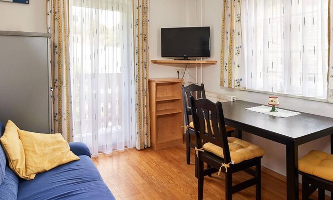 Weissenbach Apartment | Inviting Dirndl Apartment with Kitchen & Spa at Abenteuerhof Schiefer