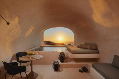 Imerovigli Hotel | Unforgettable Divine Cave Experience with Oceanfront Views