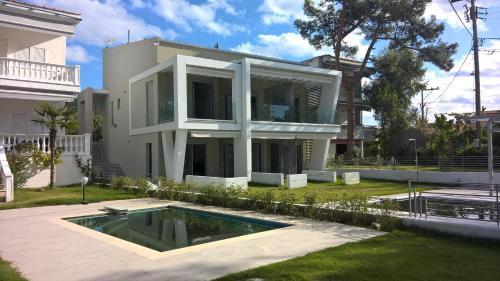 Toroni House | Oceanfront Divine Luxury Apartments with Pool & 9/10 Rating