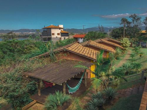Praia do Rosa Hotel | Pet-Friendly Doce Cabana Pousada with Ocean Views & Pool
