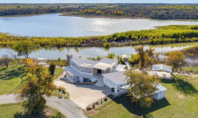 Runaway Bay House | Dock & Fire Pit: Riverfront Runaway Bay Retreat